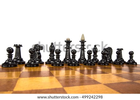 black chess pieces on the board
