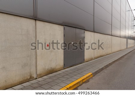 Industrial building wall with emergency exit