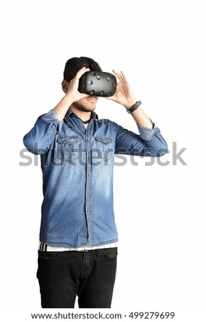 young man using VR virtual reality glasses headset