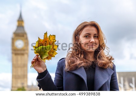Woman and Big ben in the autumn, Westminster