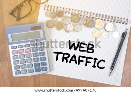 WEB TRAFFIC (business, technology, internet and networking concept ) A finance Money, calculator notes, calculator top view with work
