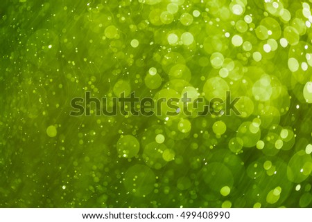 Abstract bokeh background, green light color