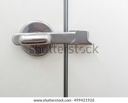 Stainless handle for lock toilet room.