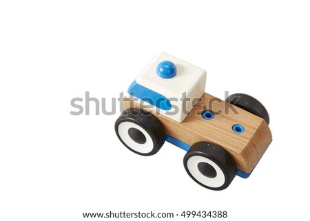 Toy wooden blue car isolated on White 