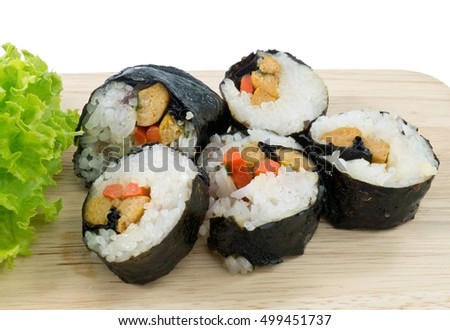 Japanese Cuisine, Fresh Veggie Sushi Rolls or Vegetable Maki with Green Oak Served on Wooden Tray.