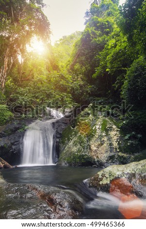 Krok-E-Dok waterfall with sunlight in mountain at Thailand National Park. Vintage filtered.