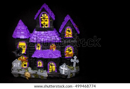 Toy Ghost house with copy space for halloween