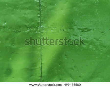 Green color painted metallic sheet