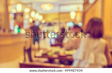 image of blur people at Japanese restaurant for background usage.