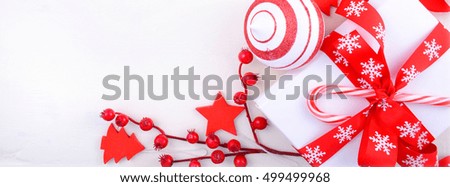 Bright festive red and white theme Christmas Holiday background with decorated borders on white wood, sized to fit a popular social media cover image placeholder.