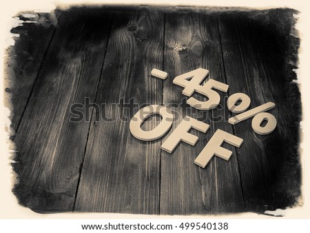 forty-five percent discount, the numbers and letters on a wooden background, vintage look of old wood