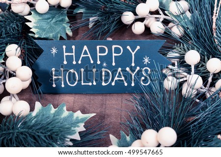 happy Holiday written on wooden background
