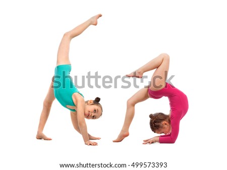 Flexible kids gymnasts doing acrobatic feat, isolated on white background. Sport, active lifestyle concept