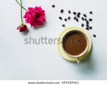 Coffee time with beauty pink flower on white desk of relaxation in morning, break time, holiday or weekend, Top view and copy space