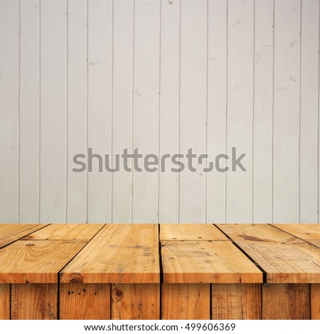 Empty top shelves or table wood on concrete wall background.For put product and some thing