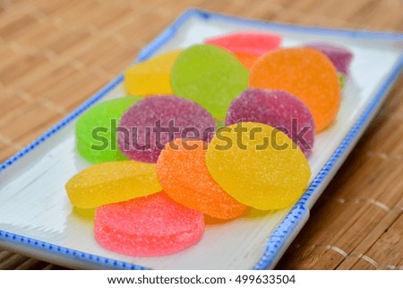 Border of colorful jelly candies.