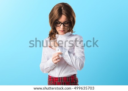 Teen student girl on blue backgound