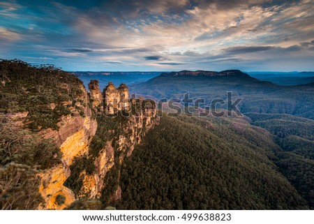 The Three Sisters from Echo Point in the Blue Mountains National Park at Sunset. Royalty-Free Stock Photo #499638823