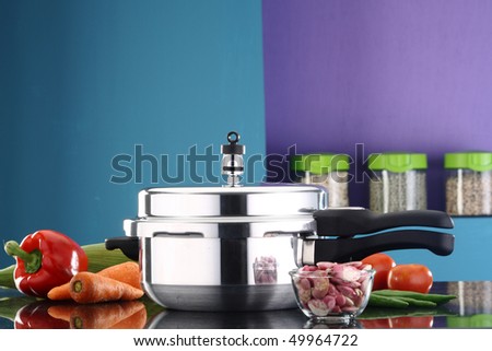 A pressure cooker in a kitchen ambiance Royalty-Free Stock Photo #49964722