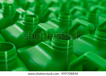 Empty plastic cans green color.