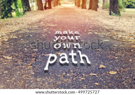 Make your own path. Motivational quote to create future on nature background.