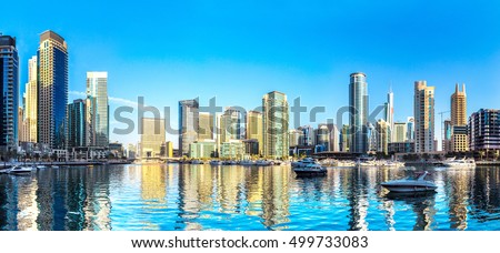 Panorama of Dubai Marina in a summer day, UAE Royalty-Free Stock Photo #499733083