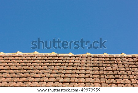  red roof on the blue sky