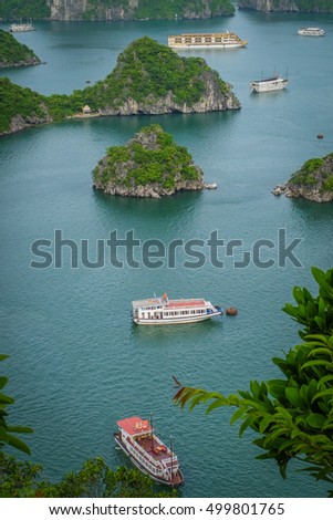 Halong bay boat hotel from top view on ti top Island Royalty-Free Stock Photo #499801765