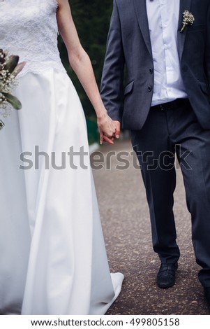couple holding hands together romantic love concept