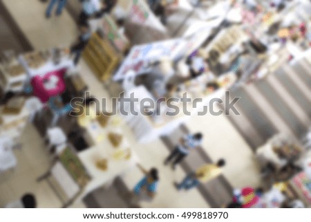 Supermarket abstract blur background. Shopping mall defocused photo for banner template or backdrop. Sale season blurry image. Shopping displays and shoppers in blur. Modern department store blur