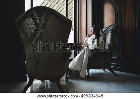 wonderful  bride sitting on the big chair