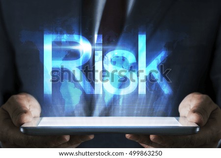 Business concept on tablet with hologram