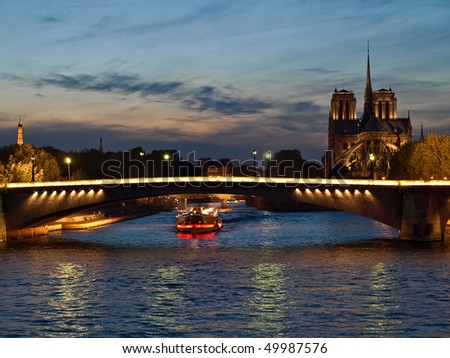 Highlighted from boat houses on Seine, Paris, France Royalty-Free Stock Photo #49987576
