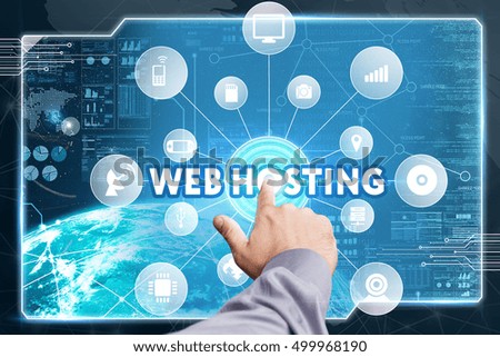 Business, Technology, Internet and network concept. Young businessman working on a virtual screen of the future and sees the inscription: web hosting
