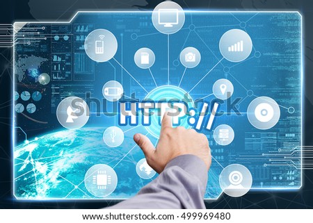 Business, Technology, Internet and network concept. Young businessman working on a virtual screen of the future and sees the inscription: HTTP://