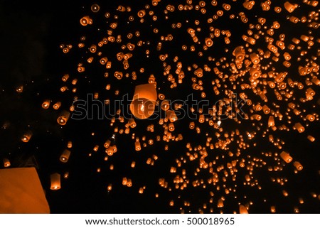 Chinese lanterns in the night sky

