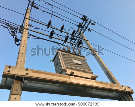 Electrical transformer with clear blue sky