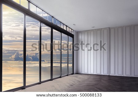 Top view clouds like an ocean, view from clear glass window door frame interior room,  luxury hotel beautiful interior with white walls and wood.