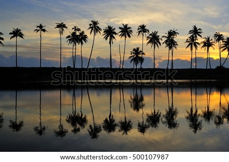 Sunrise in early morning at tropical beach at Terengganu, Malaysia. Terengganu fishing village