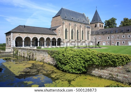 The church and annex of the Castle Alden Biesen in Belgium Royalty-Free Stock Photo #500128873
