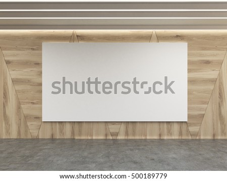 Large horizontal poster is hanging on the wooden wall of room with concrete floor. Concept of advertising. Mock up
