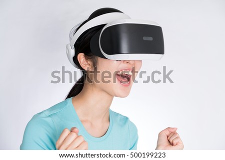 Young woman with virtual reality headset isolated on white background