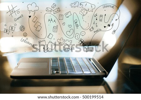 Side view of computer with creative communication icons sketch. Social media concept