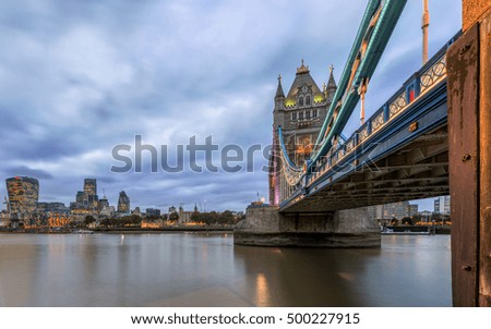 Entrance to Tower Bridge and the City of London on a cloudy evening