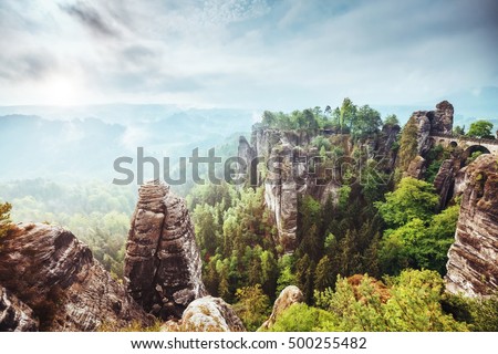 View of the Elbe Sandstone Mountains. Location place Saxony Switzerland national park, East Germany, Europe. Popular tourist attraction. Dramatic and picturesque scene. Artistic picture. Beauty world.
