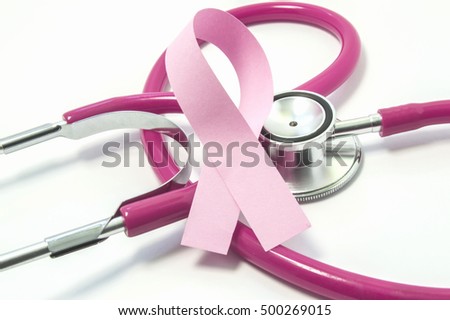 Concept of Breast Cancer. Pink ribbon near the pink-purple stethoscope doctor of breast screening, symbolizing the diagnosis, treatment, fight, awareness and support  of women's breast cancer close up