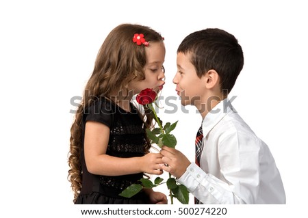 small children with flowers. a boy and a girl.