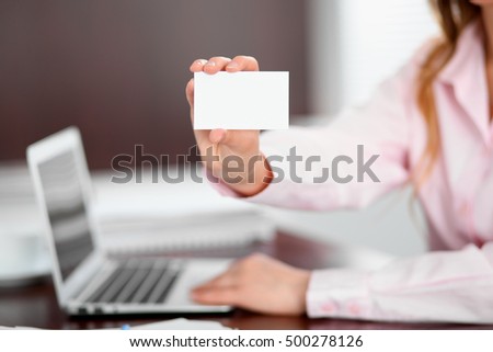 Business woman giving visit card