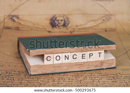 word written on wood block in the vintage book .