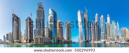 Panorama of Dubai Marina in a summer day, UAE Royalty-Free Stock Photo #500296993